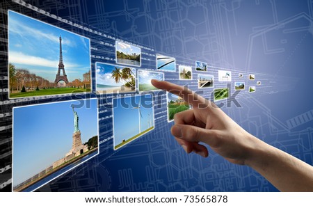 Finger pushing picture/button on a curved touch screen interface