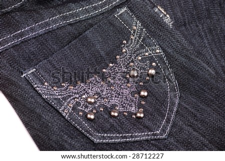 Black jeans with a beautiful embroidery on a pocket and pastes.