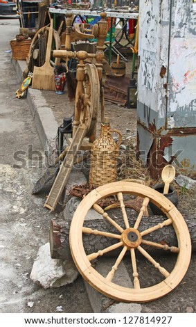 Sale of vintage old-time folk household crafts on the market of old-time goods in Kiev