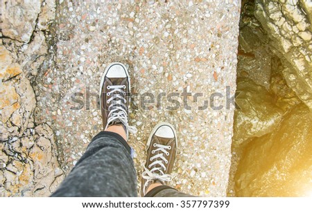 close up of a girl\'s shoes that walking alone-lifestyle concept