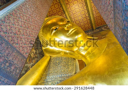 Bangkok,Thailand, june 10,2015.Reclining Buddha gold statue face. Wat Pho, Bangkok, Thailand.
