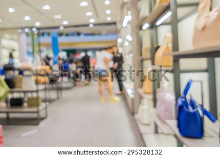 Blured of city shopping people crowd at marketplace bag shop abstract background.