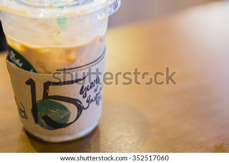 Hongkong ,china - October 12: Glass of fresh Starbucks Coffee Frappuccino Blended Beverages wood table in starbucks on October 12, 2015 in Hongkong. Starbucks is the largest coffee house company.