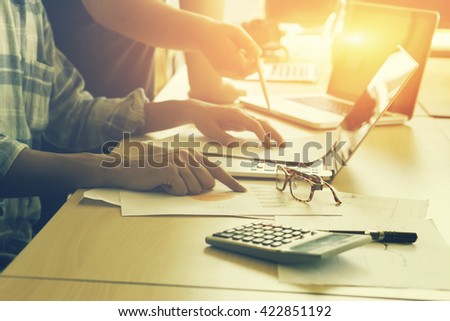 Team work concept,team meeting,Business people using laptop at office, business crew working with new startup project laptop. Project managers meeting. Analyze plans.selective focus,vintage color