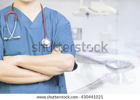 Double exposure of surgeon posing with arms crossed in an operating theatre,surgical room,doctor with operating room,healthcare and medical concept,stethoscope,medical,healtcare,selective focus