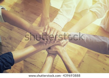 Business Teamwork concept,Business team standing hands together for united in the office.Business people joining hands together.People work Teamwork holding hands together.cooperation success