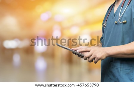 Medical and healthcare,Male doctor or medical students or surgeon,anesthesiologists using digital tablet during the conference,Health Check with digital system support for patient,background banner