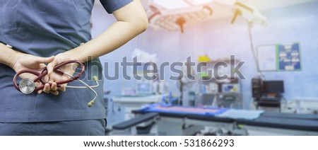 Doctor with stethoscope in a hospital,medical students during the conference,Health Check system support for patient,test results and patient registration,medical,selective focus