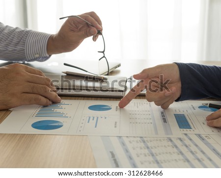 manager analyze financial numbers to view the performance of the company. accounts concept, working concept, meeting concept.