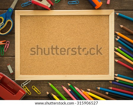 cork board and stationery put on desk free space for text . view from above. educations concept, back to school concept.