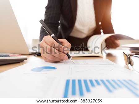 Fund Manager analyzing investment charts. concept of finance, investing, analysis business.