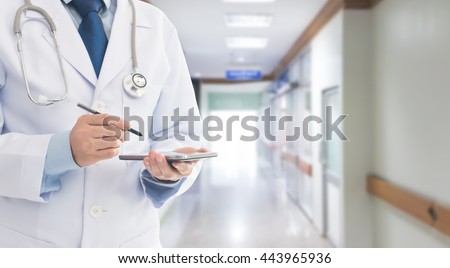 Doctor using a smart phone in hospital. Concept of healthcare and medical, communication.