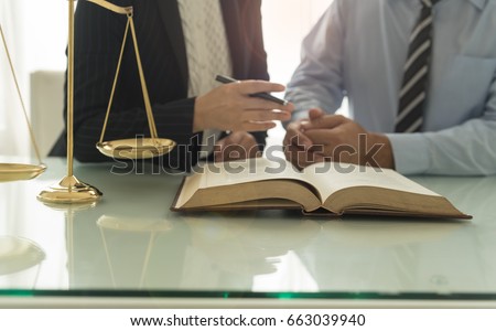 Law and Legal services concept. Lawyer and attorney having team meeting at law firm.