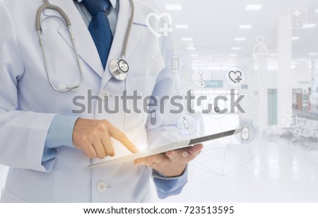 healthcare technology and medical concept. doctor using digital tablet with screen interface.