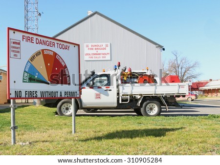 DUNOLLY, VICTORIA, AUSTRALIA - August 23, 2015: An official CFA vehicle and Fire Danger Ratings sign outside the Dunolly CFA building - the local command facility