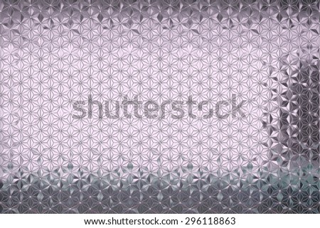 Geometric purple mirror texture with oriental elements.