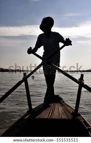 Man rowing boat at Mekong delta, Chau Doc (Vietnam)