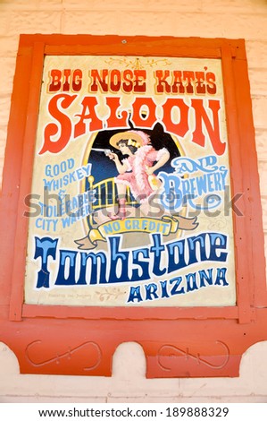 TOMBSTONE, ARIZONA - APRIL 18: Sign indicating a far west saloon on April 18, 2011 in Tombstone, Arizona. OK Corral gunfight  occurred in this village.