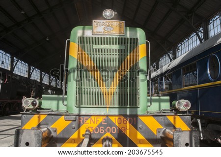 MADRID - FEB 2, 2014: Old trains in railway museum of Madrid on February 2, 2014 in Madrid, Spain. Located in the Las Delicias Station, is one of the largest historic railroad collections in Europe.