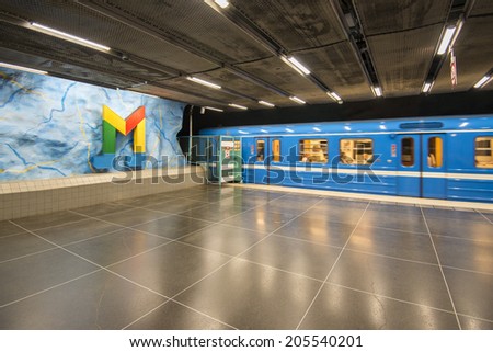 STOCKHOLM, SWEDEN - JUNE 10, 2014:  Stadion metro  station is full of sculptures and signs designed in the rainbow colors of the Olympic rings on June 10, 2014 in Stockholm, Sweden.