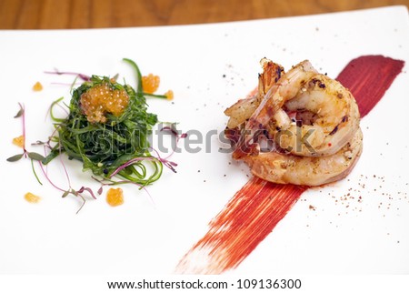 Shrimp prawn seafood appetizer with seaweed and fish roe