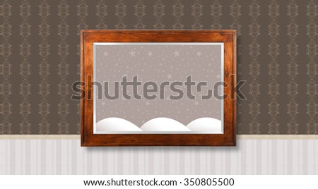 Wooden frame hanging in the middle of the wall with textured wallpaper - Picture with starry sky background with snow mountains