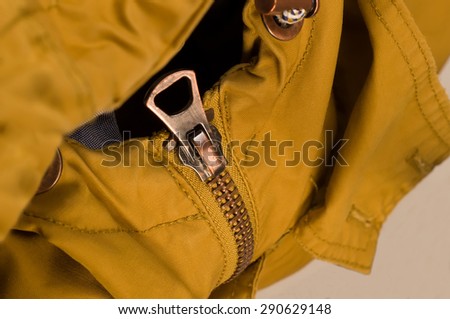 zip on the jacket, khaki