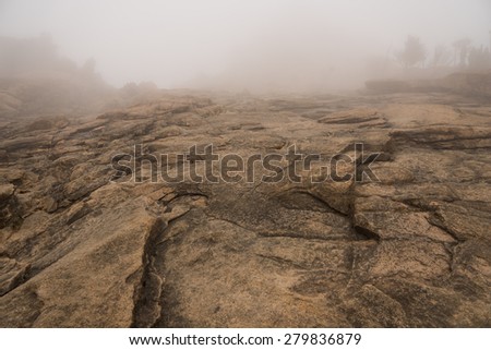 mountain ground surface, together with the fog in front.