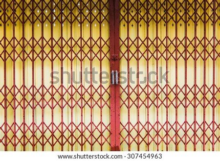 red and yellow iron slide door