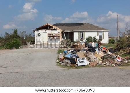 JOPLIN, MO - MAY 22: It\'s said that humor can help relieve tension in extreme situations, so this well placed sign in the aftermath of a killer EF-5 tornado should bring some relief and smiles to those who can use them. May 22, 2011 in Joplin, Missouri