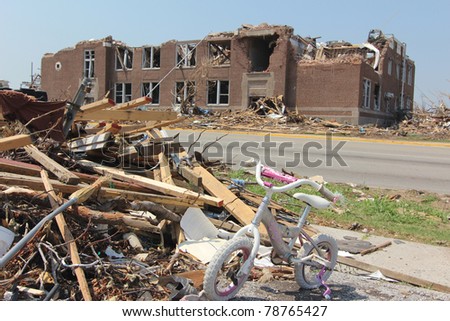 JOPLIN, MO - MAY 22: The ruins of an elementary school in Joplin, Missouri stand testament to the power of the tornado that cut a path of destruction 7 miles long and a half mile wide on May 22, 2011.