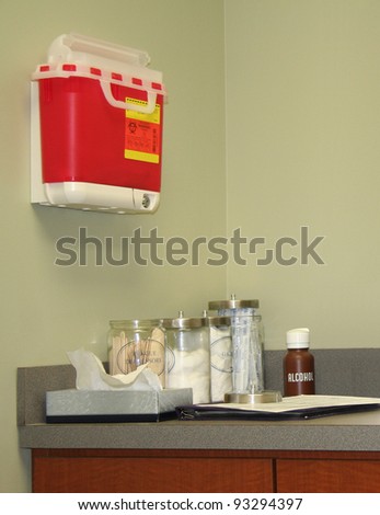 Examination room in a doctor\'s office or medical clinic complete with supplies.