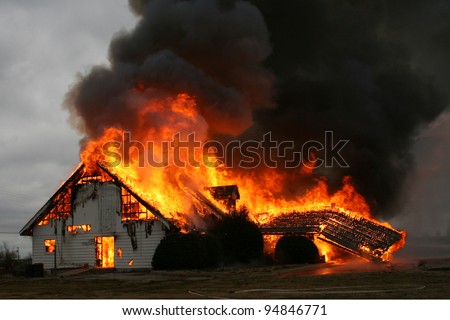 Fire is the most destructive force of nature, as in this image of a burning building, and yet it is also one of the most important forces for the good of mankind when under man\'s control.