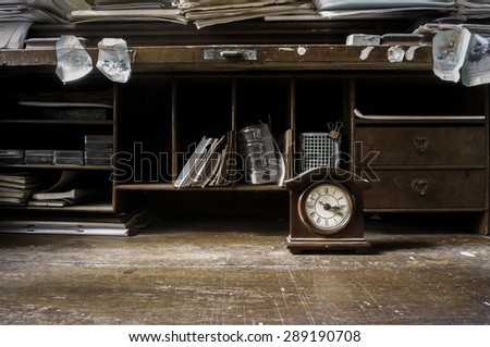 Vintage still life with retro clock on worktable, Vintage clock