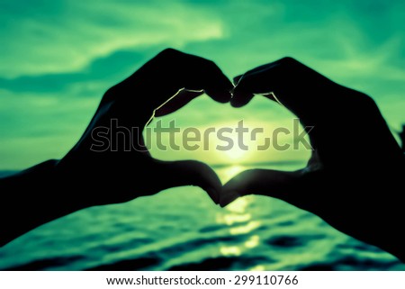 Love and heart and sunset beach and be strong sunlight before sunset and dark light