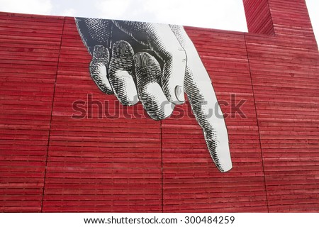 London - 19 June, 2015: Exterior shot of the \'Pointing The Finger\' series outside of \'The Shed\', The National Theatre\'s temporary venue at the South Bank, London UK