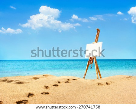 Landscape with easel on summer sunny day on the beach. Recreation concept