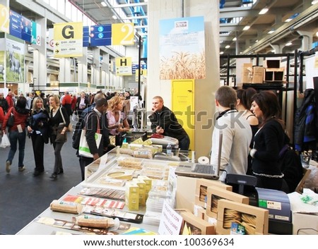 TORINO, ITALY - OCT. 24: People visit local and international food stands at Salone del Gusto, international fair of tastes and slow food on October 24, 2010 in Torino, Italy.