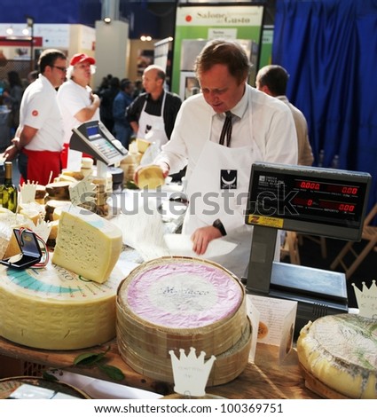 TORINO, ITALY - OCT. 24: Selling local food products at Salone del Gusto, international fair of tastes and slow food on October 24, 2010 in Torino, Italy.