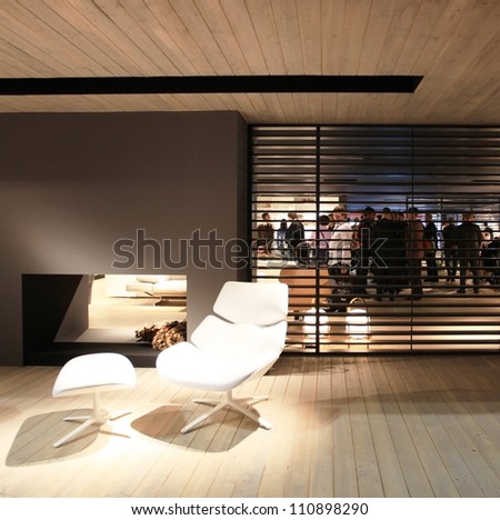 MILAN - APRIL 13: People visit home architecture solutions area at Salone del Mobile, international furnishing accessories exhibition on April 13, 2011 in Milan, Italy.