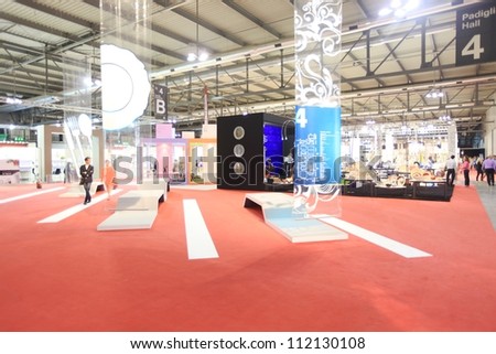 MILAN, ITALY - SEPTEMBER 06: People look at interiors design solutions and home decoration exposition at Macef, International Home Show Exhibition on September 06, 2012 in Milan, Italy.