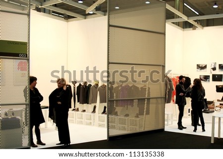 MILAN, ITALY - FEBRUARY 26: People visit accessories and clothes collections at Milano fashion design week February 26, 2010 in Milan, Italy.
