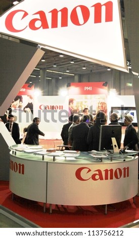 MILAN, ITALY - OCT. 19: People at Canon technologies stands at SMAU, international fair of business intelligence and information technology October 19, 2011 in Milan, Italy.