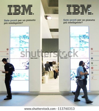 MILAN, ITALY - OCT. 19: People visiting IBM technologies area during SMAU, international fair of business intelligence and information technology October 19, 2011 in Milan, Italy.