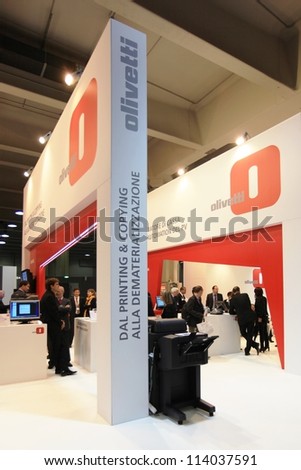 MILAN, ITALY - OCT. 19: People visiting Olivetti technologies area during SMAU, international fair of business intelligence and information technology October 19, 2011 in Milan, Italy.
