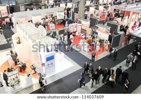 MILAN, ITALY - OCT. 19: View of people visiting technologies exhibition area during SMAU, international fair of business intelligence and information technology October 19, 2011 in Milan, Italy.