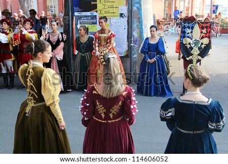 LEVANTO, ITALY - JULY 24: Local people participate to traditional historic parade with customs and flags celebrations during San Giacomo days July 24, 2012 in Levanto, Italy.