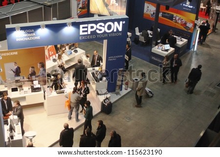 MILAN, ITALY - OCTOBER 21: People visit Epson technologies products exhibition area during SMAU, national fair of business intelligence and information technology October 21, 2009 in Milan, Italy.