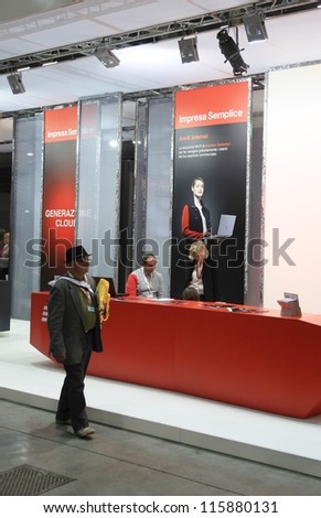 MILAN, ITALY - OCTOBER 17: People at Telecom technologies products area at SMAU, international fair of business intelligence and information technology October 17, 2012 in Milan, Italy.