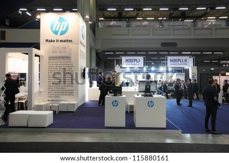 MILAN, ITALY - OCTOBER 17: People visit HP technologies products area at SMAU, international fair of business intelligence and information technology October 17, 2012 in Milan, Italy.
